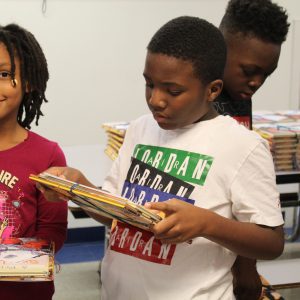 Rock Island's Artsy Bookworm Store Donates Books To Rock Island Students