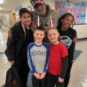 Beloved Rock Island Crossing Guard Repays Students' Kindness with Special Surprise