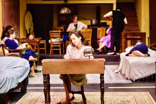Emma Terronez (center) stars in "The Diary of Anne Frank" at Playcrafters, Moline.