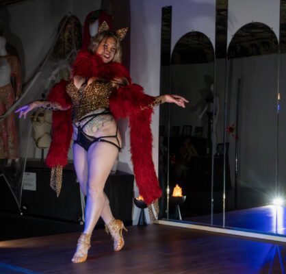 Danielle Colby, who turns 50 on Dec. 3, performing burlesque at her Ecdysiast Arts Museum in downtown Davenport, Oct. 25, 2025.