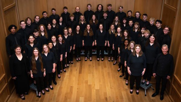 Dr. Jon Hurty (lower right) pictured with the Augustana Choir, which toured Nebraska, Colorado and Kansas in March 2025.