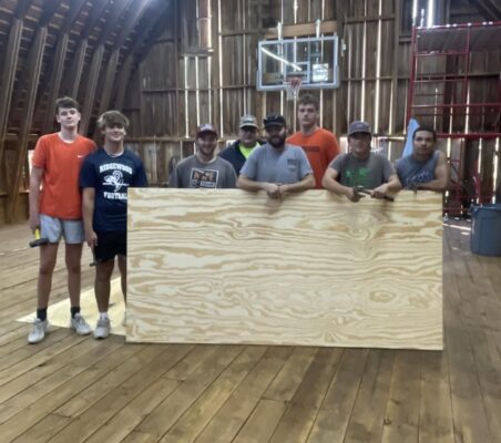 Chuck Odeen renovated his Cambridge barn for a basketball court, for local kids to play.