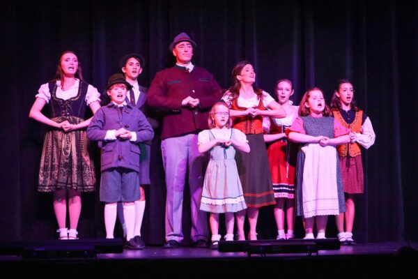 The von Trapp family singers performing "Edelweiss" near the end of "The Sound of Music" at Music Guild, 1584 34th Ave., Moline.